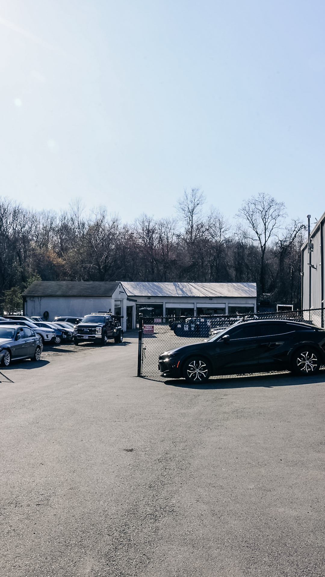Front sensor and camera area on vehicle requiring ADAS calibration at Quality Auto Body in Fairfax, VA