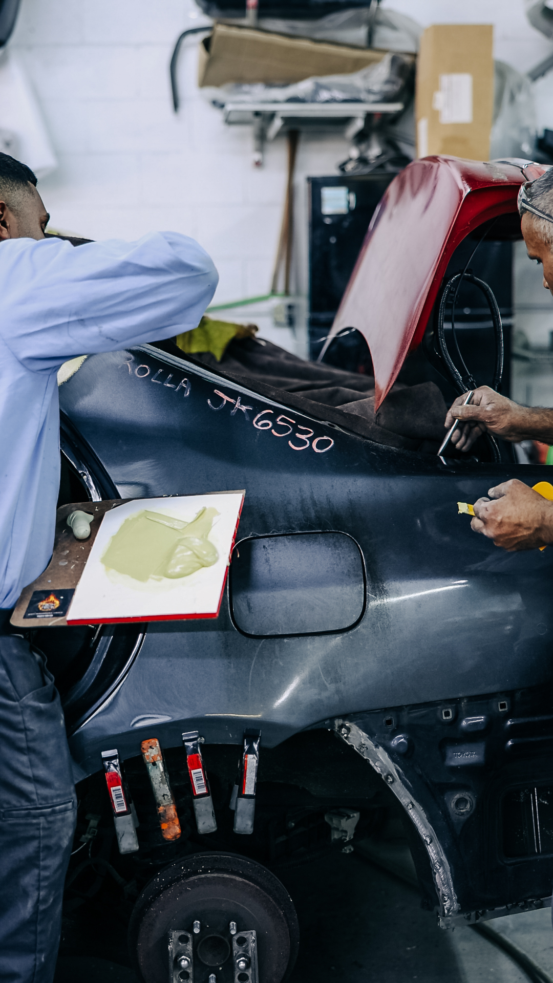 Filler application at Quality Auto Body